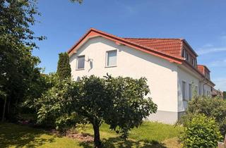 Wohnung kaufen in 31787 Hameln, Gepflegte 4-Zimmer-Eigentumswohnung mit Gartenanteil und Garage