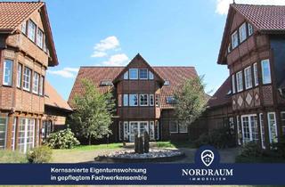 Wohnung kaufen in 31558 Hagenburg, Kernsanierte Eigentumswohnung in gepflegtem Fachwerkensemble in Hagenburg