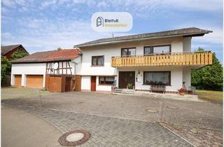 Haus kaufen in 35321 Laubach, Mehr Platz für Ihre Ideen – Zweifamilienhaus mit Scheune und vielseitigen Nutzungsmöglichkeiten