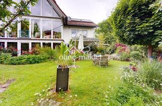 Haus kaufen in Muddenkamp 8, 34414 Warburg, Großzügiges Familienhaus mit Wärmepumpe, PV-Anlagen, Garten und Einliegerbereich in Warburg