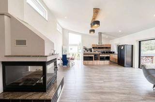 Haus kaufen in Dorfstraße 31, 39638 Berenbrock, Barrierefreier Neubau-Bungalow inkl. Einbauküche, Kamin, Garage & Whirlpool mitten in der Natur!