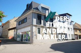 Einfamilienhaus kaufen in 55286 Wörrstadt, Stilvoll saniertes Einfamilienhaus mit zusätzlichen Mieteinnahmen!