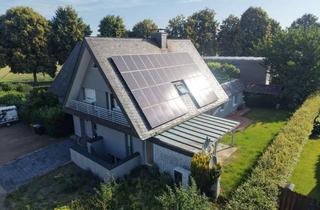 Mehrfamilienhaus kaufen in 48499 Salzbergen, Energetisch saniertes Mehrfamilienhaus mit drei Wohneinheiten in Salzbergen-Holsten