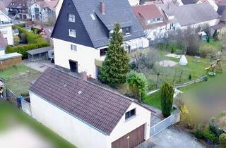 Haus kaufen in 72184 Eutingen, Viel Platz, großes Potenzial: 2-Familienhaus mit Werkstatt, 4 Garagen und Ausbaureserve