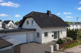 Einfamilienhaus kaufen in 32584 Löhne, Freistehend & solide: Einfamilienhaus mit außergewöhnlich viel Nutzfläche und Garagen in Löhne-Ort