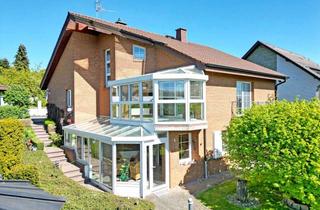 Haus kaufen in 34270 Schauenburg, Komfort-Klinkerhaus auf über 1.600 m² Traumgrundstück in reizvoller Fernblicklage von Elgershausen