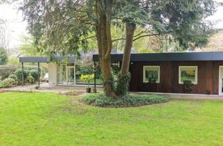 Haus kaufen in 57290 Neunkirchen, Exklusiver Bungalow in ruhiger Ortsmittenlage mit parkähnlichem Grundstück und viel Privatsphäre!