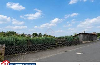 Grundstück zu kaufen in Schulstr. 21, 35444 Biebertal, Baulücke bebaubar nach 34c - ideal für einen Bungalow mit Talblick
