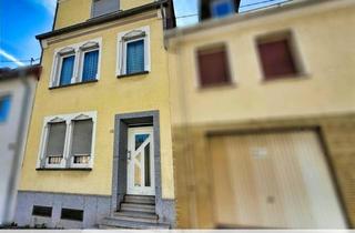 Haus kaufen in 66540 Neunkirchen, Reihenmittelhaus mit Garten und Garage in Wiebelskirchen