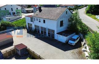 Haus kaufen in 91586 Lichtenau, Vielseitige Immobilie mit vermieteter Wohnung und großzügigen Garagenflächen