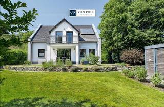 Einfamilienhaus kaufen in 61276 Weilrod, Modernes A+ Wohlfühlhaus im Weiltal mit EBK, 2 Bädern, Erdwärme und Doppelcarport