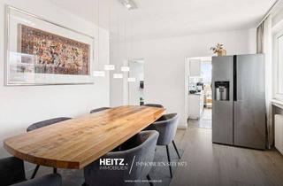 Wohnung kaufen in 61449 Steinbach, Modernisierte 4-Zimmer Eigentumswohnung mit beeindruckendem Skylineblick