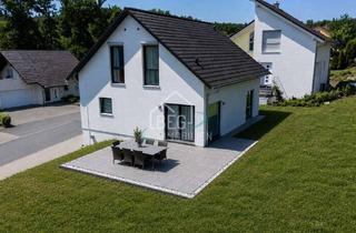 Einfamilienhaus kaufen in 74670 Forchtenberg, Modernes Familienglück – Freistehendes Einfamilienhaus mit Garten & Wärmepumpe