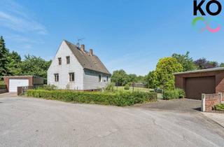 Einfamilienhaus kaufen in 47228 Bergheim, Freistehendes Einfamilienhaus mit großem Baugrundstück in familienfreundlicher Lage