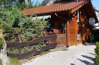 Haus kaufen in 23974 Boiensdorf, Blockbohlen-Ferienhäuschen aus Altersgründen für €139.000 zu veräußern