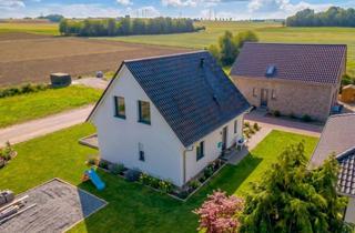 Einfamilienhaus kaufen in 55278 Uelversheim, KfW-40-QNG-Einfamilienhaus auf großem Eckgrundstück in ruhiger Feldrandlage von Uelversheim