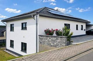 Haus kaufen in 54657 Neidenbach, Modernes Ein- oder Zweifamilienhaus mit zwei Garagen, Photovoltaik und KfW-55-Standard in Neidenbach
