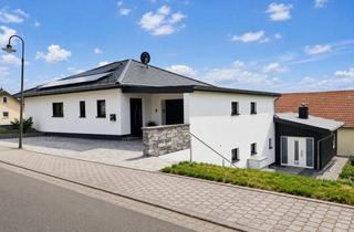 Haus kaufen in 54657 Neidenbach, Modernes Ein- oder Zweifamilienhaus mit zwei Garagen, Photovoltaik und KfW-55-Standard in Neidenbach