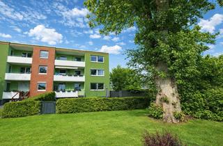 Wohnung kaufen in 25436 Uetersen, Erstklassige Erdgeschosswohnung mit Balkon und Garten - Grüne Wohnidylle in Uetersen