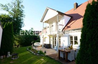 Einfamilienhaus kaufen in 85259 Wiedenzhausen, Familienfreundliches Einfamilienhaus mit Doppelgarage und sonnigem Garten