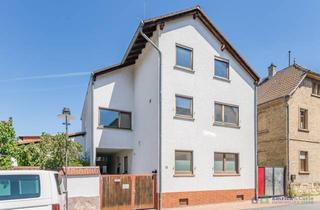 Einfamilienhaus kaufen in 55262 Heidesheim, Ein Haus - zahlreiche Möglichkeiten: Zweifamilienhaus mit Garten und Garage