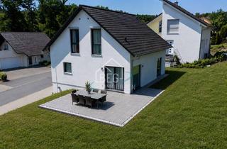Einfamilienhaus kaufen in 74670 Forchtenberg, Modernes Familienglück – Freistehendes Einfamilienhaus mit Garten & Wärmepumpe
