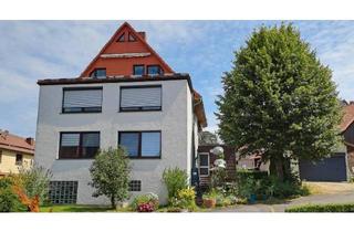 Haus kaufen in 34355 Staufenberg, Staufenberg - 2 vermietete MFH inkl. Garagen