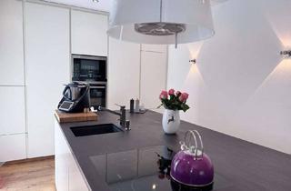 Wohnung kaufen in 86836 Untermeitingen, Luxuriöse 4 ZKB Wohnung mit schön angelegtem Garten