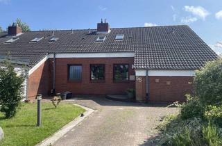 Doppelhaushälfte kaufen in 25917 Leck, Doppelhaushälfte mit stilvollem Wohnambiente, Gartenidylle und PV-Anlage