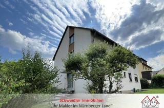 Haus kaufen in 90587 Veitsbronn, Schönes 3-Familienhaus in Veitsbronn: Gepflegte Kapitalanlage mit zwei Garagen und Gartengrundstück