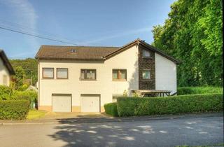 Einfamilienhaus kaufen in 56470 Bad Marienberg, Familienfreundliches Ein- oder Zweifamilienhaus mit Doppelgarage und großem Platzangebot !