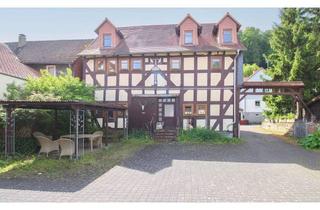 Haus kaufen in 35083 Wetter, Vielseitiges Fachwerkhaus mit Charakter in Wetter-Amönau – Wohnen und Vermieten unter einem Dach