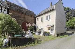 Einfamilienhaus kaufen in 56357 Niederwallmenach, Sanierungsobjekt mit Potenzial im Zentrum von Niederwallmenach