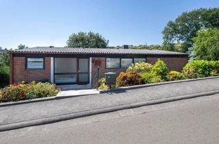 Haus kaufen in 67729 Sippersfeld, Lichtdurchfluteter Bungalow-Traum mit paradiesischem Flair