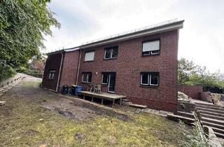 Haus kaufen in 25712 Burg, Zwei Wohnungen, viele Möglichkeiten – Ein Haus mit Herz in ruhiger Wohnlage