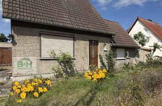 Einfamilienhaus kaufen in 06779 Raguhn, Freistehendes Einfamilienhaus mit großem Grundstück und Garage in beliebter Wohnlage von Raguhn
