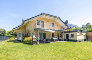 Einfamilienhaus kaufen in 56249 Herschbach, Modernes Einfamilienhaus mit großzügigem Wohnkonzept, Garten und E-Ladestation