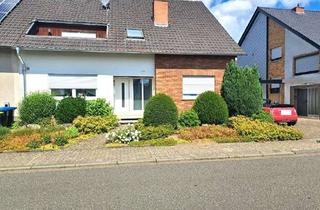 Einfamilienhaus kaufen in 66346 Püttlingen, großzügiges einseitig angebautes Einfamilienhaus in ruhiger Lage in Püttlingen