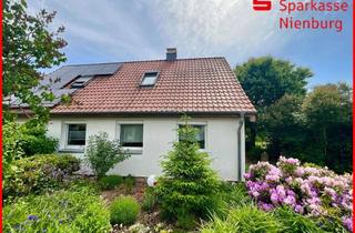 Haus kaufen in 31582 Nienburg, Familienfreundliches Wohnen auf weitläufigen Grundstück