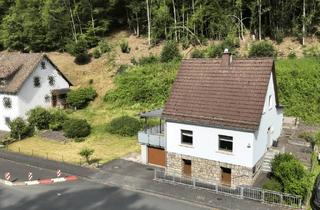Einfamilienhaus kaufen in 56271 Isenburg, Gepflegtes Einfamilienhaus mit überdachter Terrasse, Garage und Einbauküche