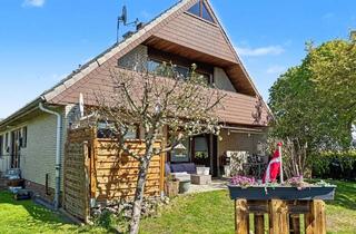 Haus kaufen in 25355 Heede, Vermietetes Zweifamilienhaus mit großem Grundstück – solide Kapitalanlage in Heede