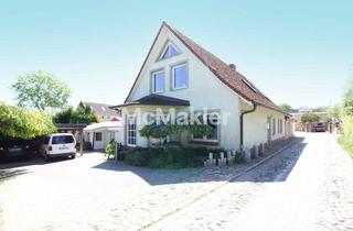 Einfamilienhaus kaufen in 18574 Garz, Einziehen und entspannen: Einfamilienhaus mit Ferienwohnung, Gewerbefläche und gepflegtem Garten