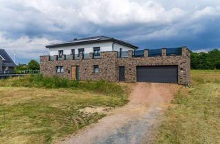 Villa kaufen in 27232 Sulingen, Exklusive Stadtvilla mit Dachterrasse, hochwertiger Designausstattung und modernster Energietechnik
