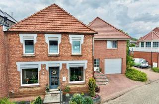 Einfamilienhaus kaufen in 49843 Uelsen, Charmantes Einfamilienhaus mit Einliegerwohnung in zentraler Wohnlage von Uelsen