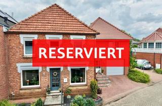 Einfamilienhaus kaufen in 49843 Uelsen, Charmantes Einfamilienhaus mit Einliegerwohnung in zentraler Wohnlage von Uelsen