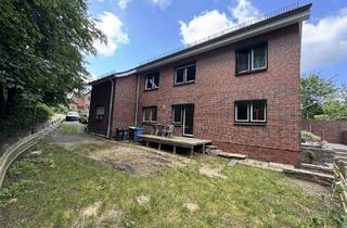 Einfamilienhaus kaufen in 25712 Burg, Zwei Wohnungen, viele Möglichkeiten – Ein Haus mit Herz in ruhiger Wohnlage!