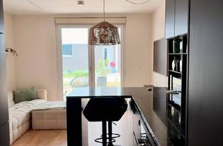 Wohnung kaufen in 86156 Augsburg, Augsburg - Moderne Erdgeschosswohnung mit Terrasse, Garten und Tiefgarage