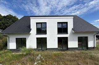 Haus kaufen in 31188 Holle, Ein Doppelhaus - zum Fertigstellen