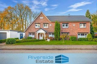 Mehrfamilienhaus kaufen in 27389 Lauenbrück, Exklusives Mehrfamilienhaus - Stilvolles Wohnhaus mit Traumgarten, 3 Garagen & viel Potenzial