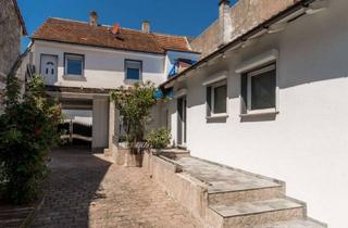 Haus kaufen in 68809 Neulußheim, Zweifamilienhaus mit Potenzial – Wohnen und Gestalten im Herzen von Neulußheim